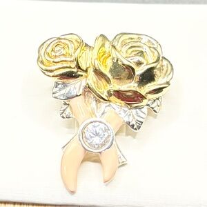 Elegant Gold and Silver Rose Brooch